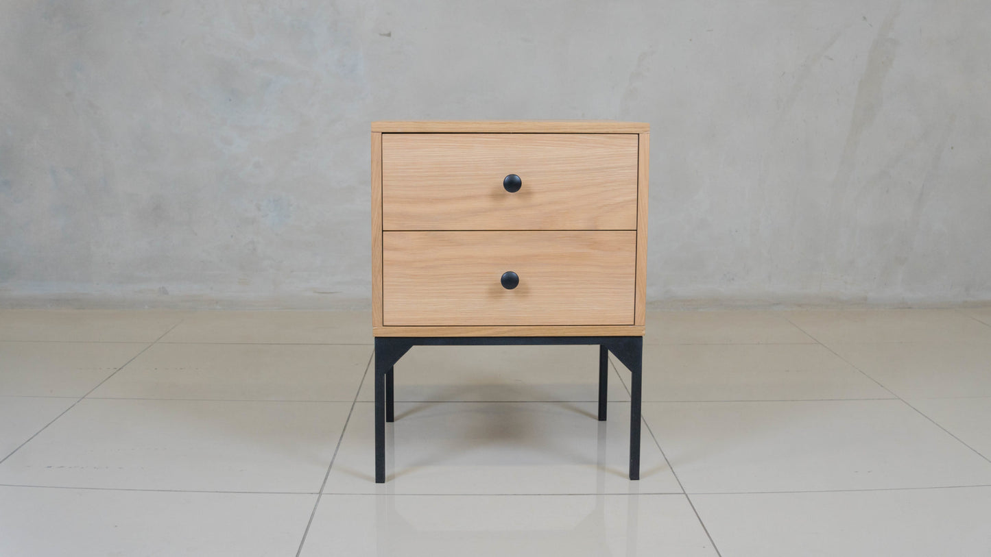 Modern oak veneer bedside table with two spacious drawers and ball-bearing runners.