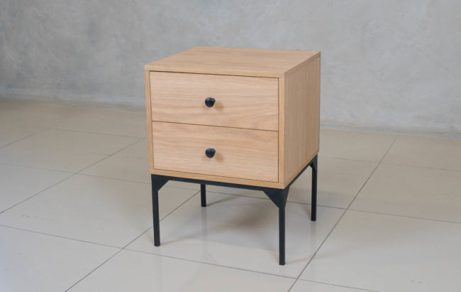 Black steel frame nightstand featuring a minimalist oak veneer design.