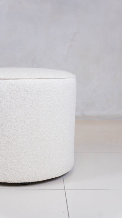 Small Shaun Ottoman with custom fabric upholstery.