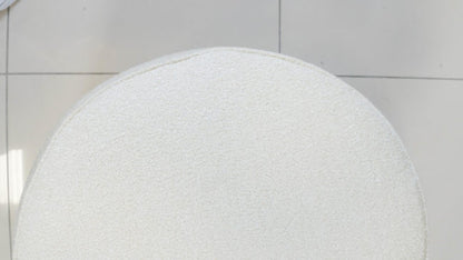 Small Shaun Ottoman with custom fabric upholstery.