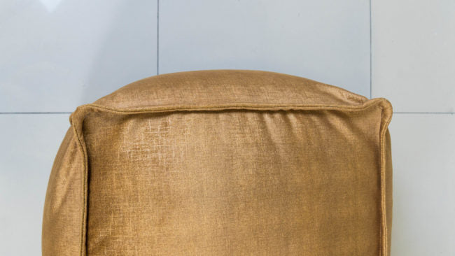 Fully upholstered ottoman, handcrafted in South Africa.