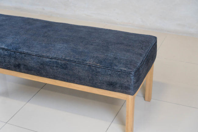 Upholstered oak frame bench, perfect for modern bedrooms.