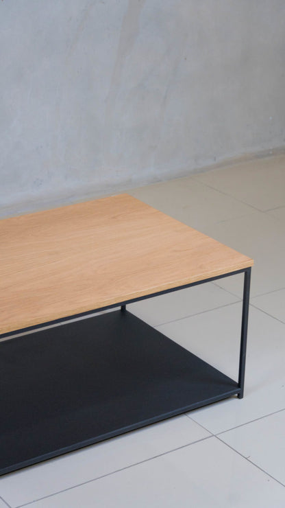 Black epoxy-coated steel frame coffee table, with dual levels.