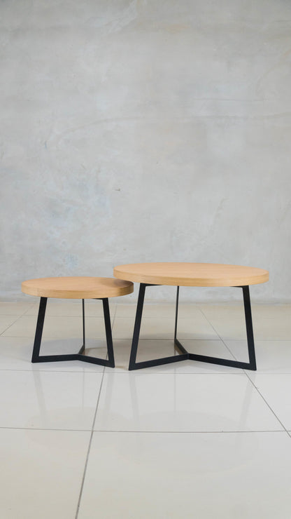 Eclipse nesting coffee table set with oak tops and black steel frames.