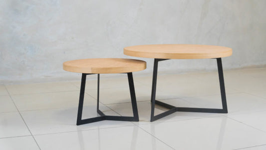 Eclipse nesting coffee table set with oak tops and black steel frames.