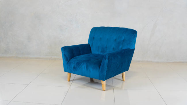 Minimalist low-seated chair, handcrafted in South Africa.