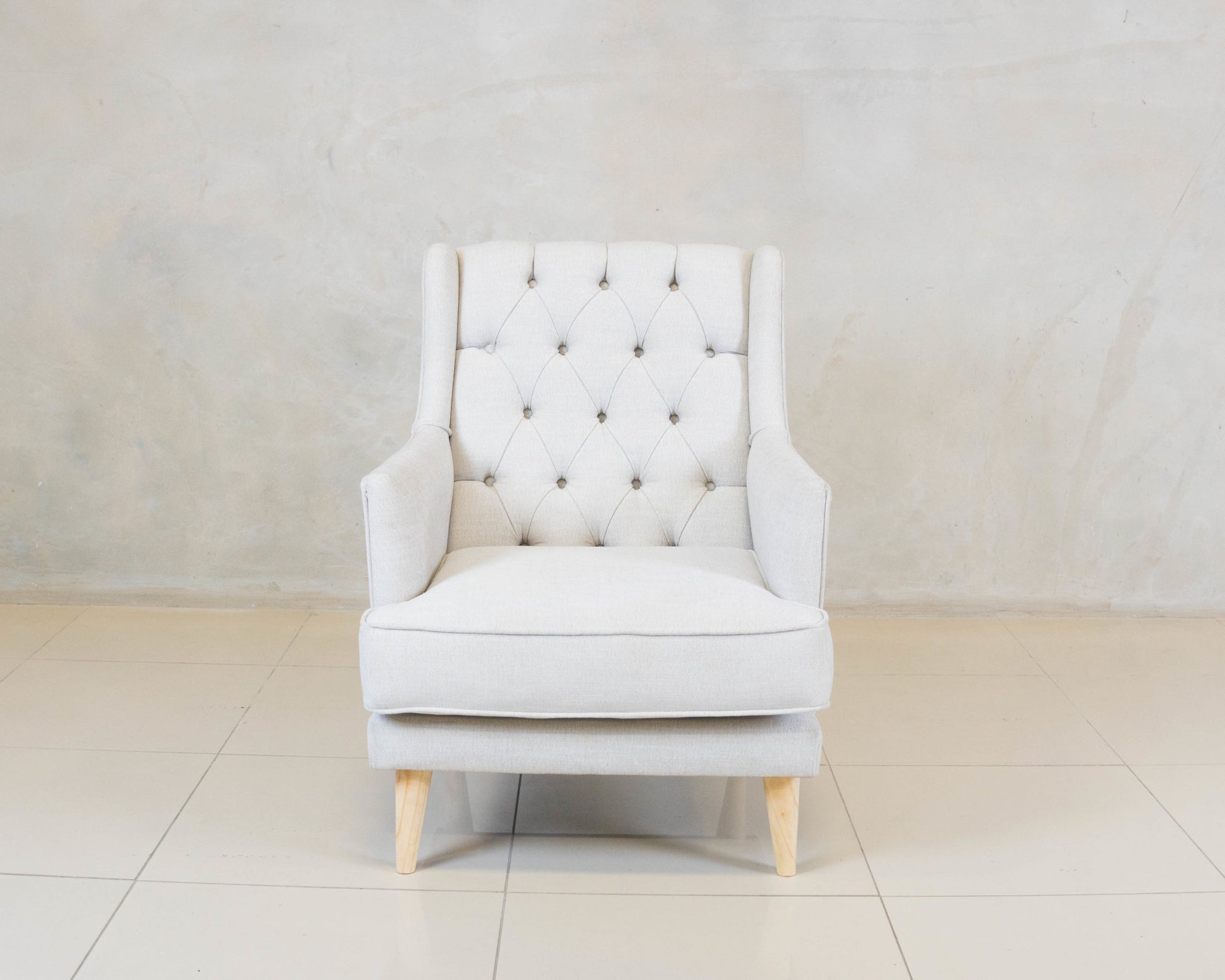Princess Armchair with deep button detailing and custom fabric.