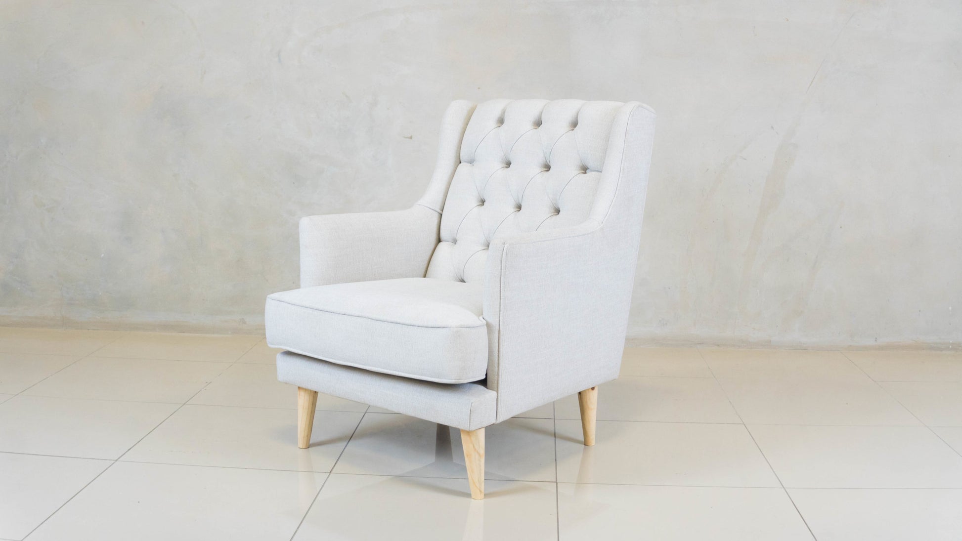 Princess Armchair with deep button detailing and custom fabric.