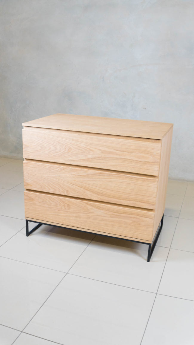 Oak drawer cabinet, perfect for stylish storage.