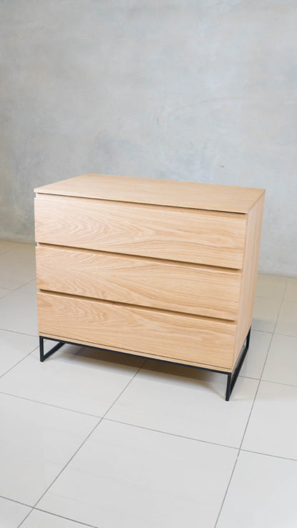 Oak drawer cabinet, perfect for stylish storage.