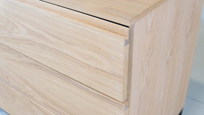 Oak drawer cabinet, perfect for stylish storage.