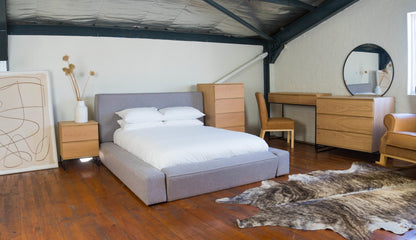 Modern Bold Bed featuring broad sides and customizable fabric options.