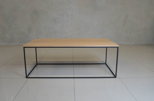 Minimalist black steel coffee table, perfect for modern spaces.