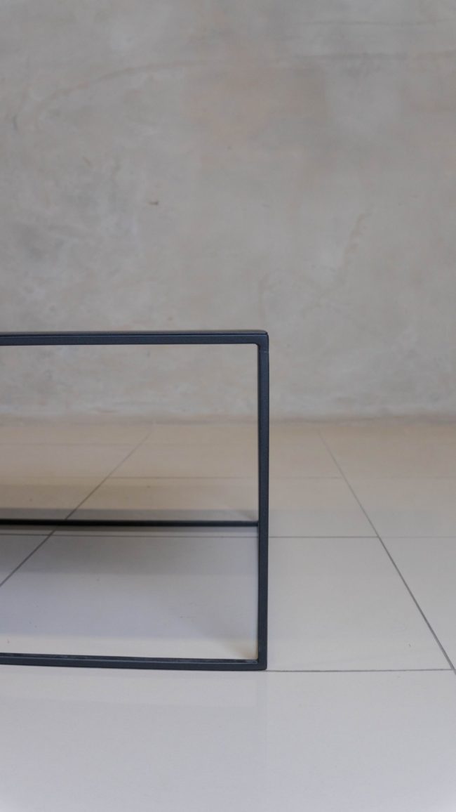 urable Corretto Steel Table with a minimalist design, perfect for modern spaces.