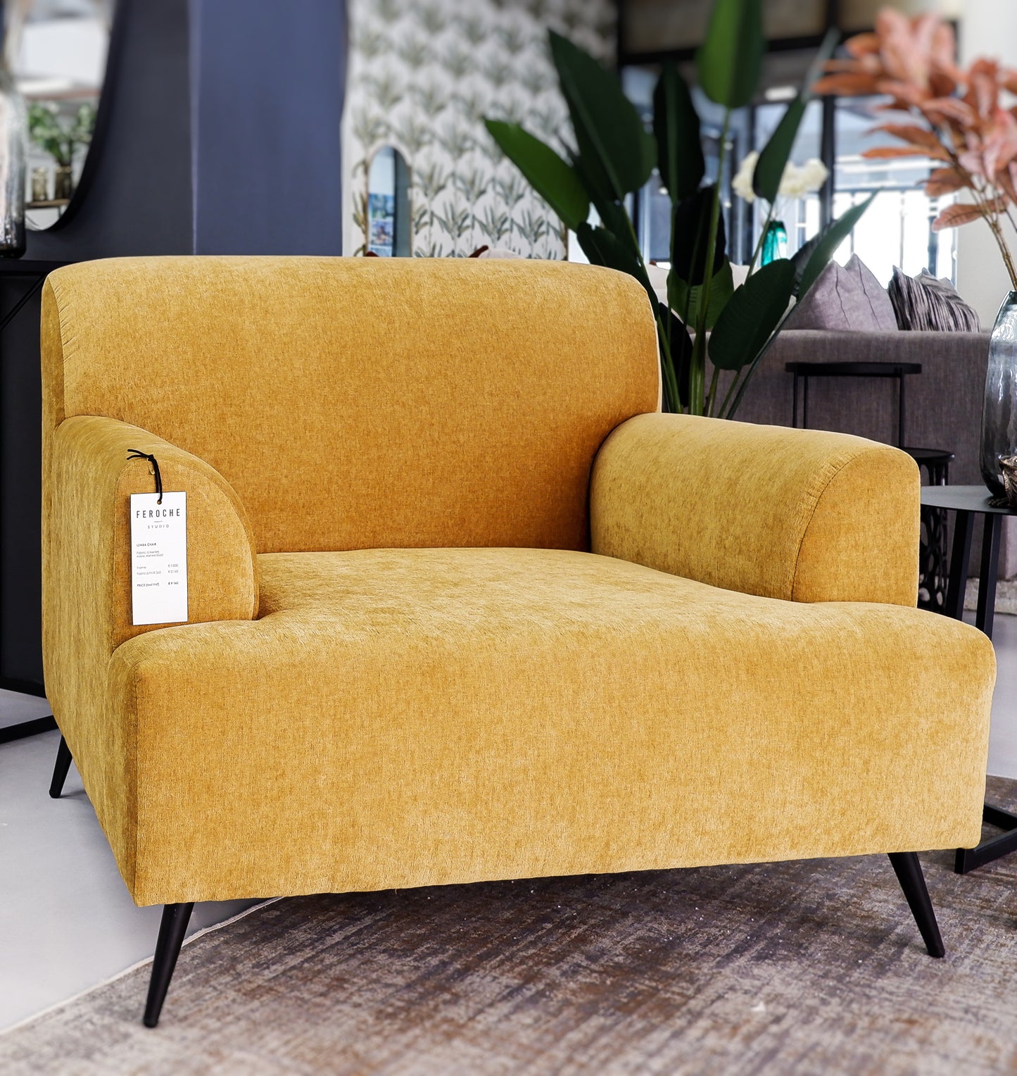 Lumba Armchair with oversized cushioning and steel feet, designer chair, Bellville’s best-selling armchair.