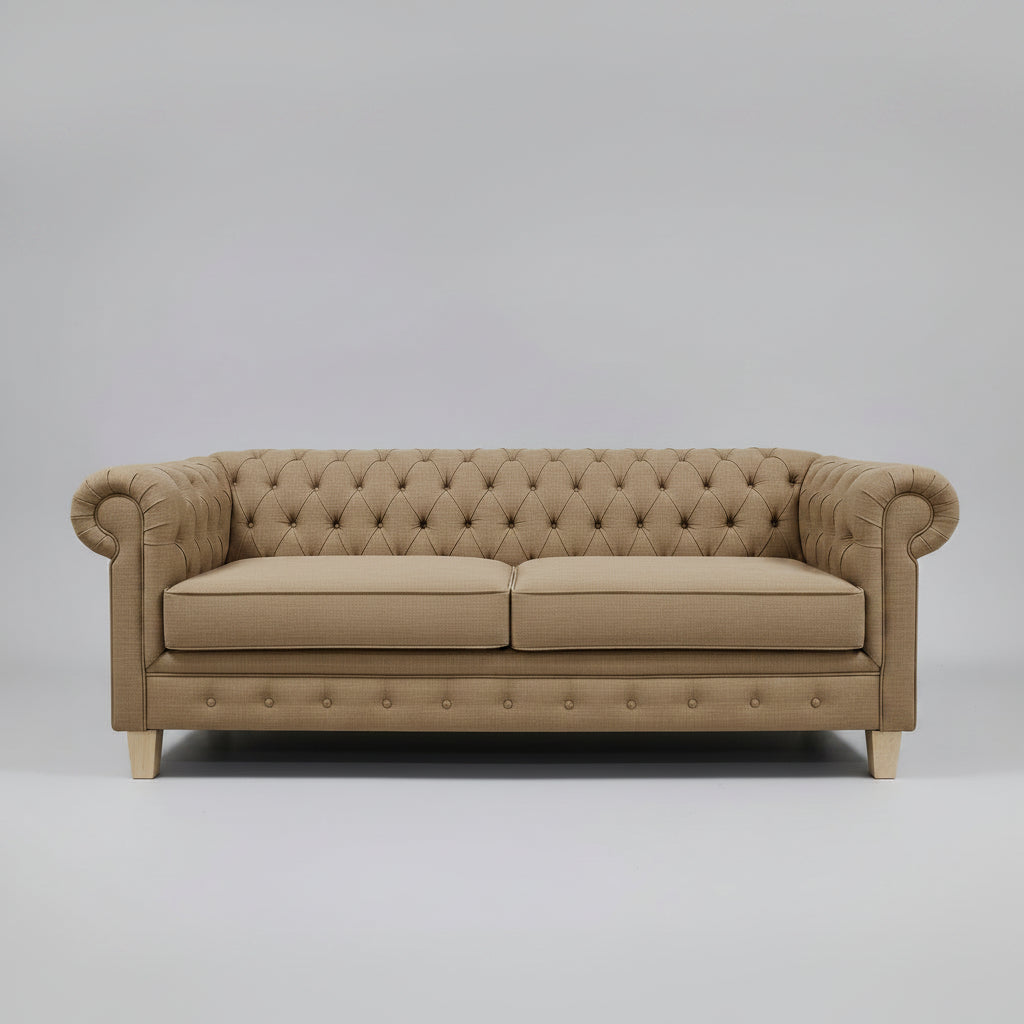 Beige tufted sofa on a gray background