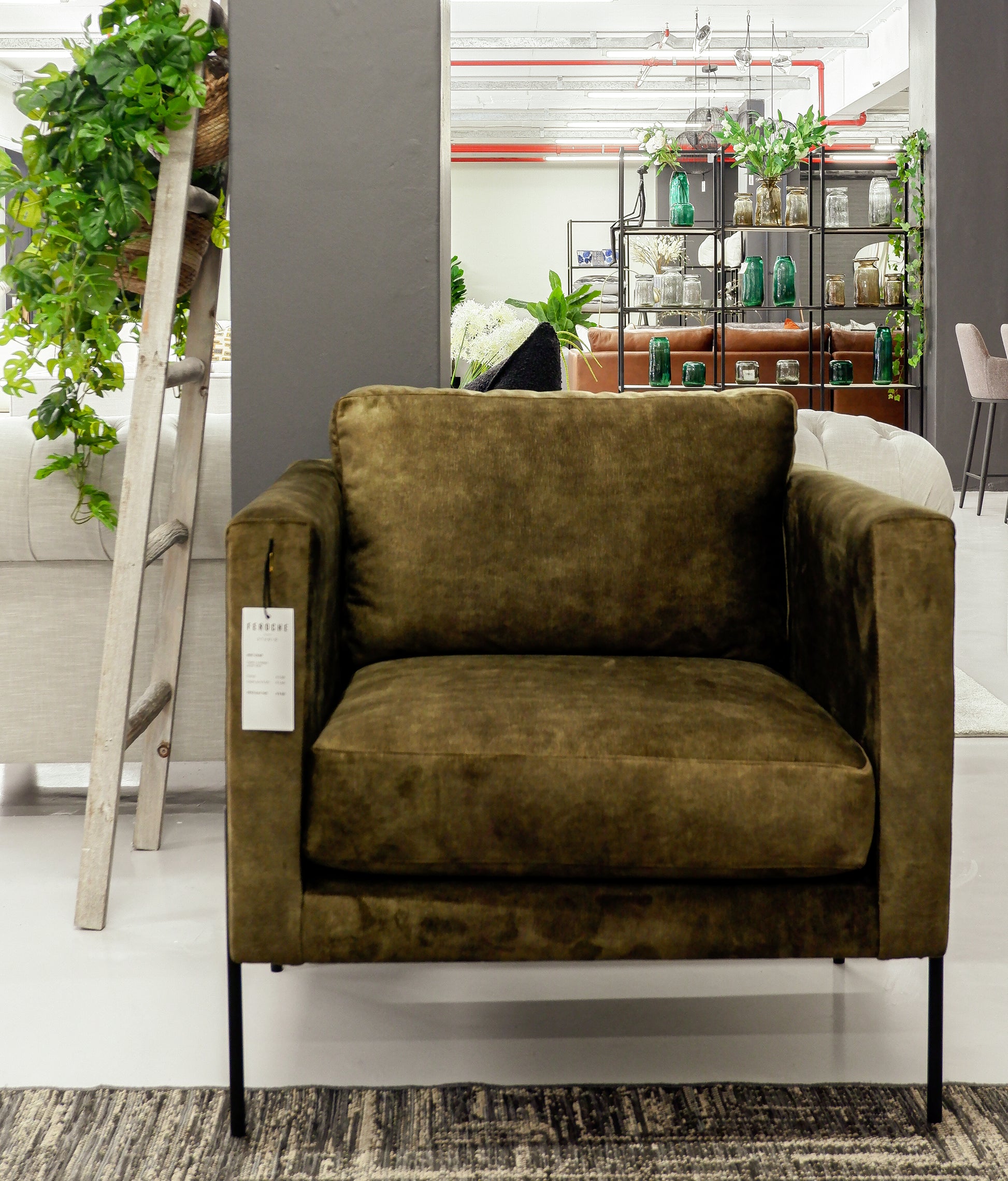 Next Armchair with custom upholstery and black steel frame.