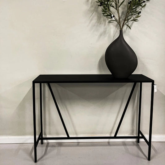 Caroline Server in black epoxy-coated steel, minimalist design.