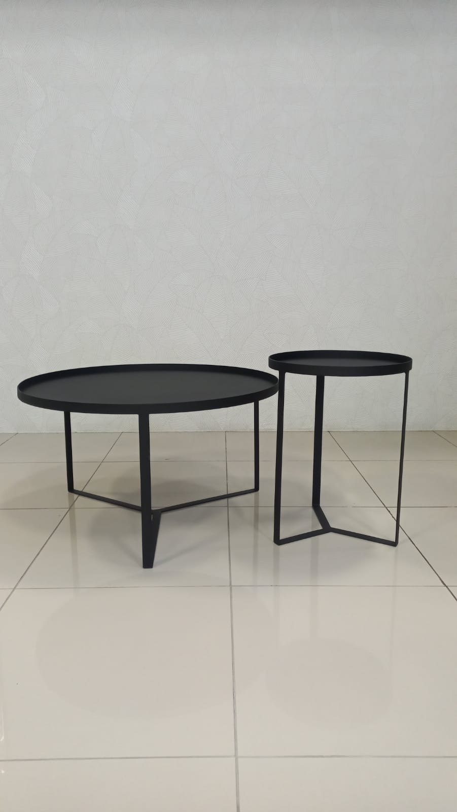 Saffron nesting coffee table set in black epoxy steel.